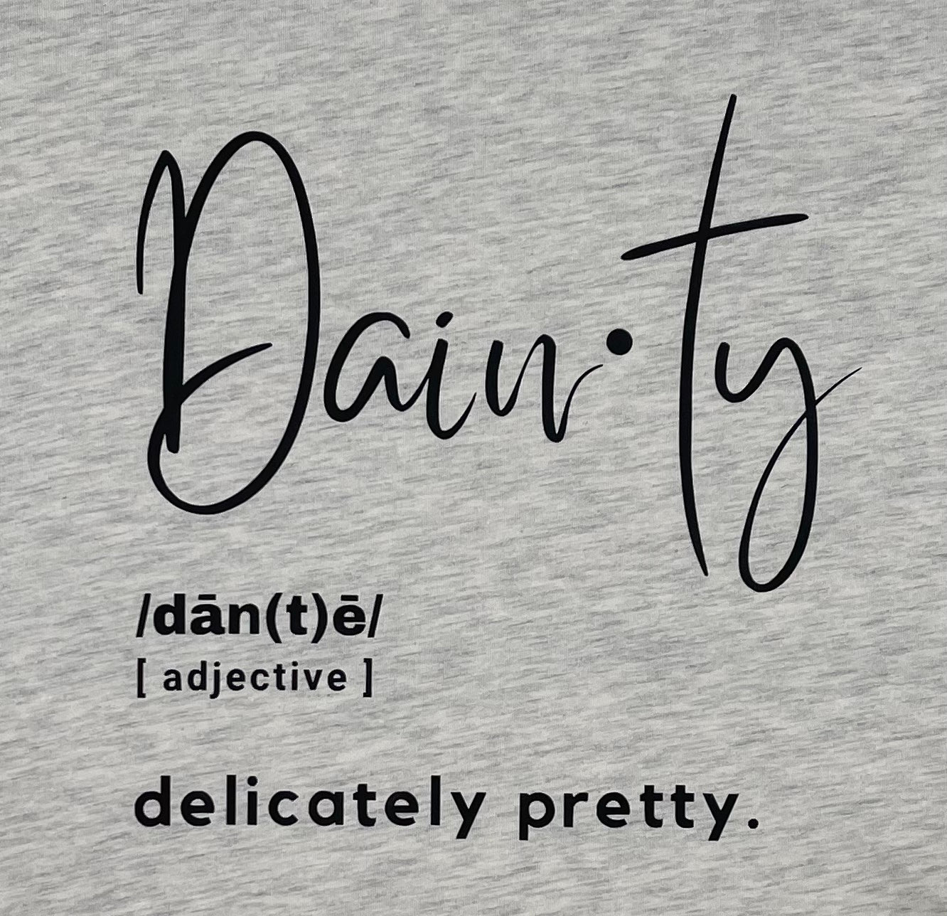 Definition of dainty with a beige background