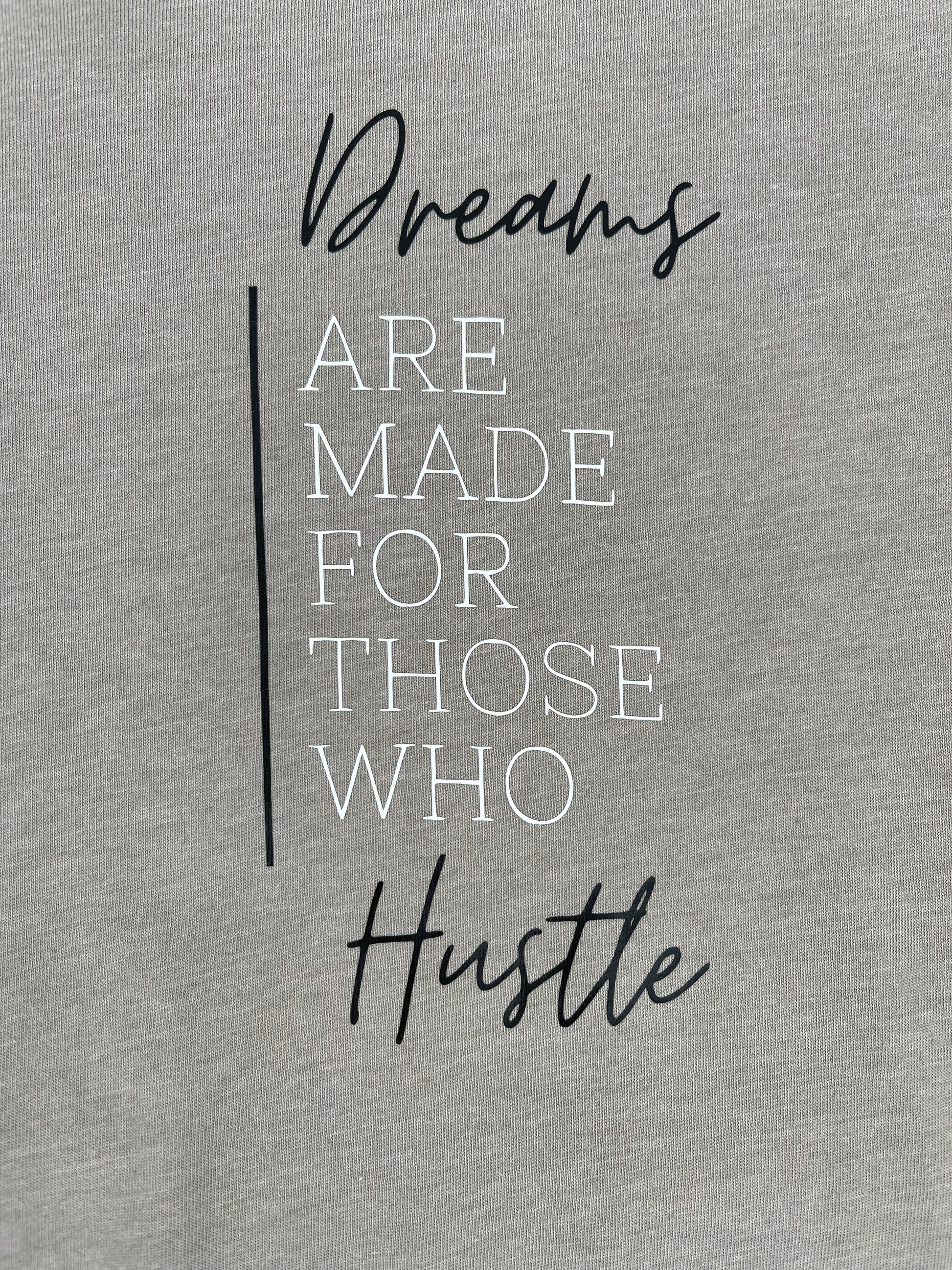 dreams are made for those who hustle quote on a beige background